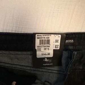 Hugo boss jeans . Dark. Never worn!